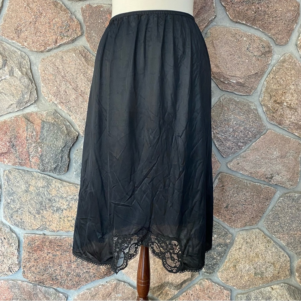 Vintage black half slip with lace trim. Made in Canada.